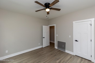 This newly built 4-bedroom, 2-bath home in the ever popular on Seven Lakes Country Club in North Carolina - for sale on GolfHomes.com, golf home, golf lot