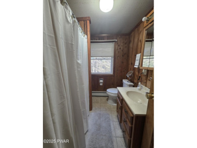 BEAUTIFUL TANGLWOOD LAKES RAISED RANCH AT LAKE WALLENPAUPACK! on Paupack Hills Golf and Country Club in Pennsylvania - for sale on GolfHomes.com, golf home, golf lot