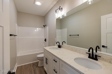 This newly built 4-bedroom, 2-bath home in the ever popular on Seven Lakes Country Club in North Carolina - for sale on GolfHomes.com, golf home, golf lot