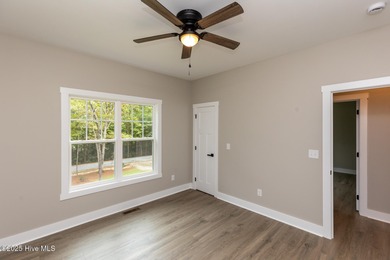 This newly built 4-bedroom, 2-bath home in the ever popular on Seven Lakes Country Club in North Carolina - for sale on GolfHomes.com, golf home, golf lot