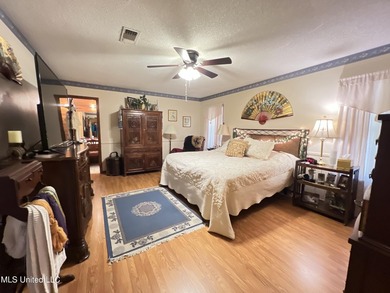 Prime Golf Course Living in Diamondhead | Wake up to sweeping on Diamondhead Country Club in Mississippi - for sale on GolfHomes.com, golf home, golf lot