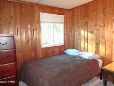 BEAUTIFUL TANGLWOOD LAKES RAISED RANCH AT LAKE WALLENPAUPACK! on Paupack Hills Golf and Country Club in Pennsylvania - for sale on GolfHomes.com, golf home, golf lot