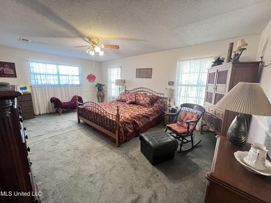 Prime Golf Course Living in Diamondhead | Wake up to sweeping on Diamondhead Country Club in Mississippi - for sale on GolfHomes.com, golf home, golf lot