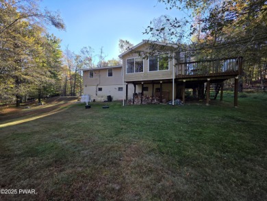 BEAUTIFUL TANGLWOOD LAKES RAISED RANCH AT LAKE WALLENPAUPACK! on Paupack Hills Golf and Country Club in Pennsylvania - for sale on GolfHomes.com, golf home, golf lot