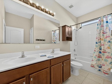 Waterfront home in Shingle Creek Reserve, where Florida living on Oaks National Golf Course in Florida - for sale on GolfHomes.com, golf home, golf lot