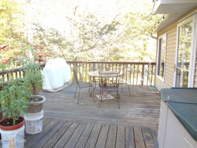 BEAUTIFUL TANGLWOOD LAKES RAISED RANCH AT LAKE WALLENPAUPACK! on Paupack Hills Golf and Country Club in Pennsylvania - for sale on GolfHomes.com, golf home, golf lot