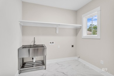 Nestled in the sought-after golf course community of Timbercreek on TimberCreek Golf Club in Alabama - for sale on GolfHomes.com, golf home, golf lot