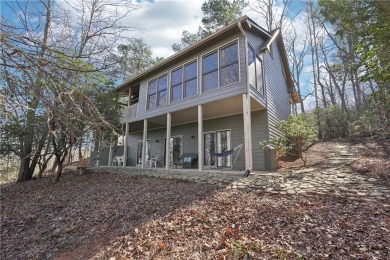 Welcome home to this charming Mountain Cottage. Nestled in the on Big Canoe Golf Club - Cherokee in Georgia - for sale on GolfHomes.com, golf home, golf lot