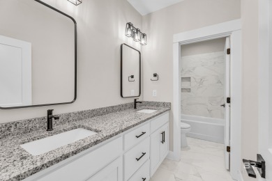 Nestled in the sought-after golf course community of Timbercreek on TimberCreek Golf Club in Alabama - for sale on GolfHomes.com, golf home, golf lot