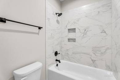 Nestled in the sought-after golf course community of Timbercreek on TimberCreek Golf Club in Alabama - for sale on GolfHomes.com, golf home, golf lot