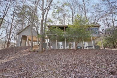Welcome home to this charming Mountain Cottage. Nestled in the on Big Canoe Golf Club - Cherokee in Georgia - for sale on GolfHomes.com, golf home, golf lot