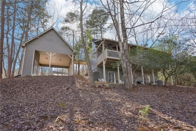 Welcome home to this charming Mountain Cottage. Nestled in the on Big Canoe Golf Club - Cherokee in Georgia - for sale on GolfHomes.com, golf home, golf lot