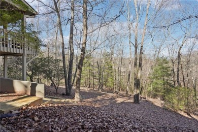 Welcome home to this charming Mountain Cottage. Nestled in the on Big Canoe Golf Club - Cherokee in Georgia - for sale on GolfHomes.com, golf home, golf lot
