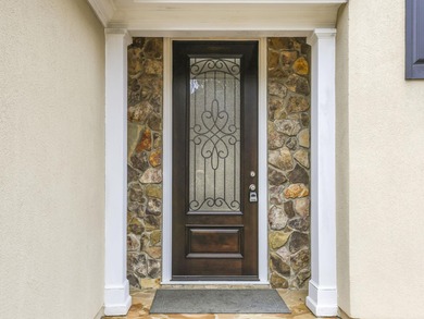 Experience country club living at its finest in this stunning on The Carolina Country Club in South Carolina - for sale on GolfHomes.com, golf home, golf lot