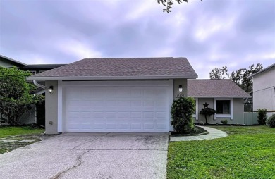 Welcome to this beautifully updated home in the highly on Northdale Golf and Tennis Club in Florida - for sale on GolfHomes.com, golf home, golf lot