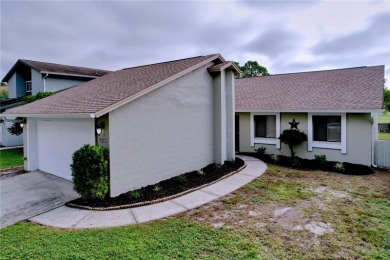 Welcome to this beautifully updated home in the highly on Northdale Golf and Tennis Club in Florida - for sale on GolfHomes.com, golf home, golf lot