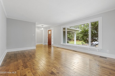 Golf Front Home in the Heart of Whispering Pines. Overlooking on Whispering Pines Golf Course in North Carolina - for sale on GolfHomes.com, golf home, golf lot