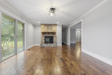 Golf Front Home in the Heart of Whispering Pines. Overlooking on Whispering Pines Golf Course in North Carolina - for sale on GolfHomes.com, golf home, golf lot