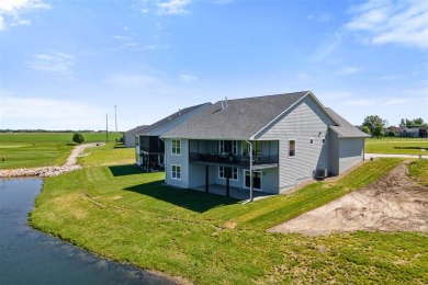 This 2024 Parade of Homes by Hodge Construction overlooks the on Saddleback Ridge Golf Course in Iowa - for sale on GolfHomes.com, golf home, golf lot