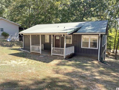 A circular concrete drive brings you to this darling home. It on  in Kentucky - for sale on GolfHomes.com, golf home, golf lot