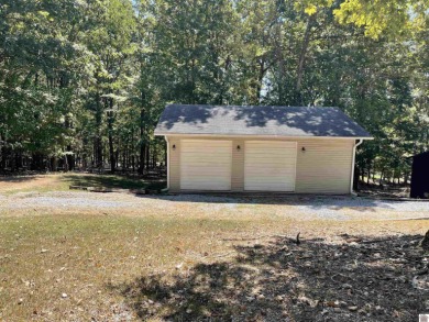 A circular concrete drive brings you to this darling home. It on  in Kentucky - for sale on GolfHomes.com, golf home, golf lot
