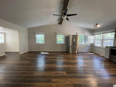 A circular concrete drive brings you to this darling home. It on  in Kentucky - for sale on GolfHomes.com, golf home, golf lot