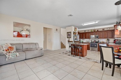 Step into this 3,677 sq ft single family home located in Palm on Keys Gate Golf Club in Florida - for sale on GolfHomes.com, golf home, golf lot