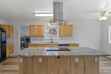 Beautifully remodeled 3-bed, 1-bath country home on  1/2  acre on Twin Falls Municipal Golf Course in Idaho - for sale on GolfHomes.com, golf home, golf lot