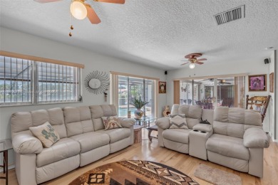 This charming 3-bed/2.5-bath home with a screened-in pool has a on Bonaventure Country Club in Florida - for sale on GolfHomes.com, golf home, golf lot