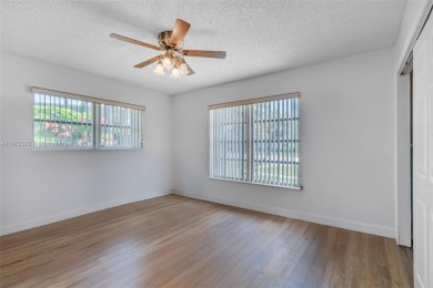 This charming 3-bed/2.5-bath home with a screened-in pool has a on Bonaventure Country Club in Florida - for sale on GolfHomes.com, golf home, golf lot