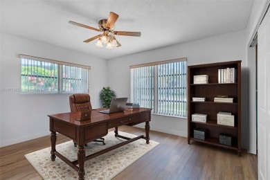 This charming 3-bed/2.5-bath home with a screened-in pool has a on Bonaventure Country Club in Florida - for sale on GolfHomes.com, golf home, golf lot