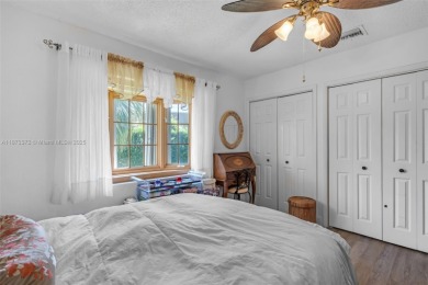 This charming 3-bed/2.5-bath home with a screened-in pool has a on Bonaventure Country Club in Florida - for sale on GolfHomes.com, golf home, golf lot