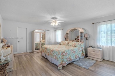 This charming 3-bed/2.5-bath home with a screened-in pool has a on Bonaventure Country Club in Florida - for sale on GolfHomes.com, golf home, golf lot