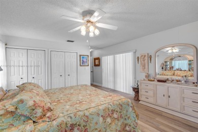 This charming 3-bed/2.5-bath home with a screened-in pool has a on Bonaventure Country Club in Florida - for sale on GolfHomes.com, golf home, golf lot