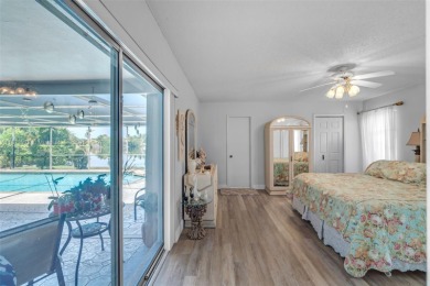 This charming 3-bed/2.5-bath home with a screened-in pool has a on Bonaventure Country Club in Florida - for sale on GolfHomes.com, golf home, golf lot