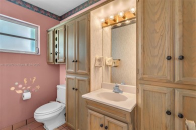 This charming 3-bed/2.5-bath home with a screened-in pool has a on Bonaventure Country Club in Florida - for sale on GolfHomes.com, golf home, golf lot