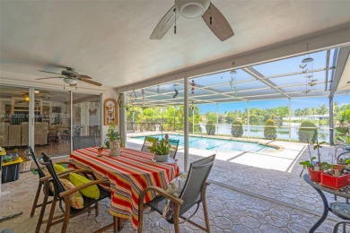 This charming 3-bed/2.5-bath home with a screened-in pool has a on Bonaventure Country Club in Florida - for sale on GolfHomes.com, golf home, golf lot