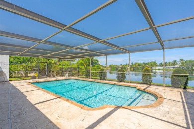 This charming 3-bed/2.5-bath home with a screened-in pool has a on Bonaventure Country Club in Florida - for sale on GolfHomes.com, golf home, golf lot
