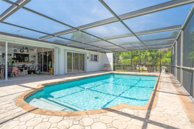 This charming 3-bed/2.5-bath home with a screened-in pool has a on Bonaventure Country Club in Florida - for sale on GolfHomes.com, golf home, golf lot