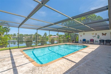 This charming 3-bed/2.5-bath home with a screened-in pool has a on Bonaventure Country Club in Florida - for sale on GolfHomes.com, golf home, golf lot