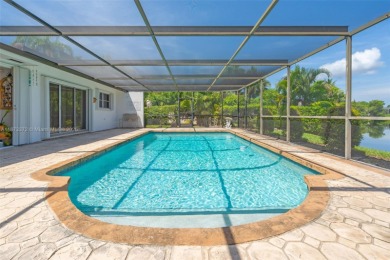 This charming 3-bed/2.5-bath home with a screened-in pool has a on Bonaventure Country Club in Florida - for sale on GolfHomes.com, golf home, golf lot