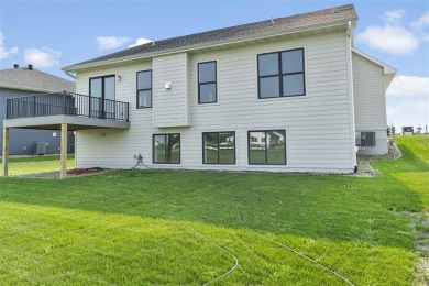 This beautiful Hodge Construction built home overlooks on Saddleback Ridge Golf Course in Iowa - for sale on GolfHomes.com, golf home, golf lot