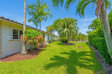 This charming 3-bed/2.5-bath home with a screened-in pool has a on Bonaventure Country Club in Florida - for sale on GolfHomes.com, golf home, golf lot