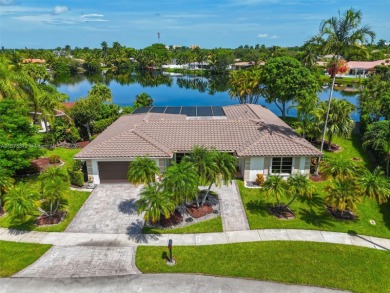 This charming 3-bed/2.5-bath home with a screened-in pool has a on Bonaventure Country Club in Florida - for sale on GolfHomes.com, golf home, golf lot