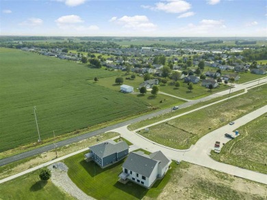 This beautiful Hodge Construction built home overlooks on Saddleback Ridge Golf Course in Iowa - for sale on GolfHomes.com, golf home, golf lot