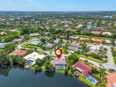 This charming 3-bed/2.5-bath home with a screened-in pool has a on Bonaventure Country Club in Florida - for sale on GolfHomes.com, golf home, golf lot
