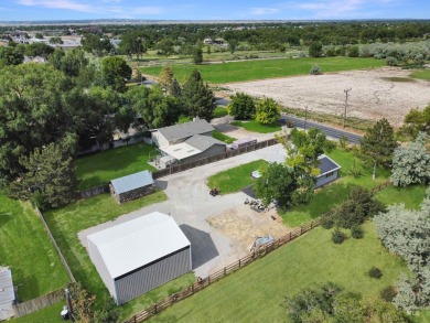 Beautifully remodeled 3-bed, 1-bath country home on  1/2  acre on Twin Falls Municipal Golf Course in Idaho - for sale on GolfHomes.com, golf home, golf lot