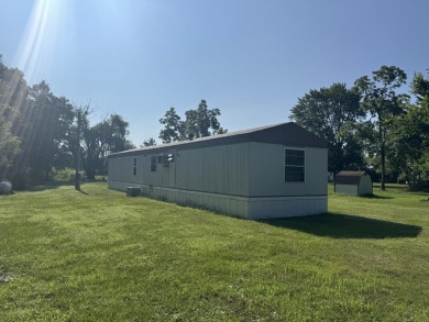 Looking for affordable country living? This charming 2-bedroom on Beeches Golf Club  in Michigan - for sale on GolfHomes.com, golf home, golf lot
