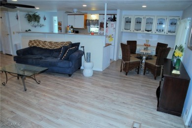 Turnkey! Modern upgrades and an exceptional location near the on Six Lakes Country Club in Florida - for sale on GolfHomes.com, golf home, golf lot