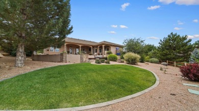 Discover luxury living at its finest in this stunning on The Golf Club At Redlands Mesa in Colorado - for sale on GolfHomes.com, golf home, golf lot